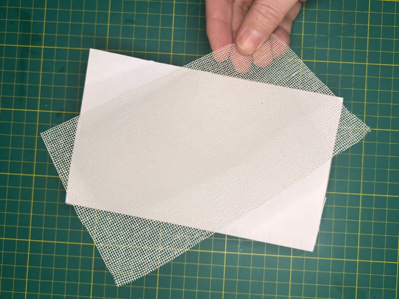 Adding fabric to the book for strength